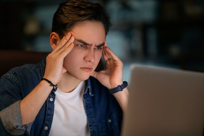 Young man researching in internet