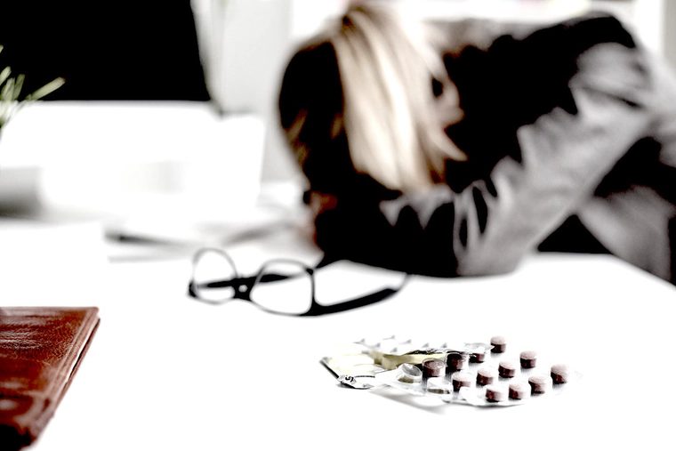 Woman sleeping at desk