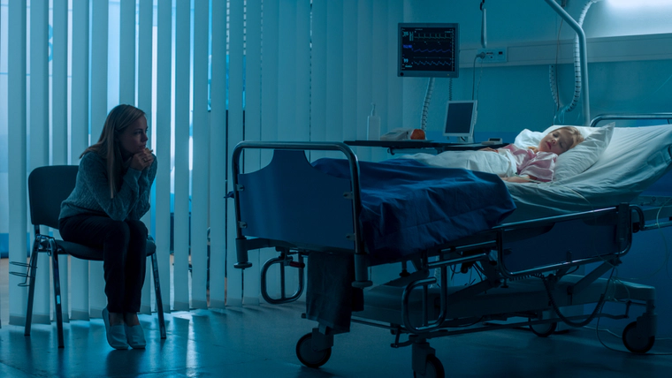 Mother with her daughter in hospital