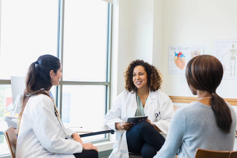 Doctors are talking with a patient